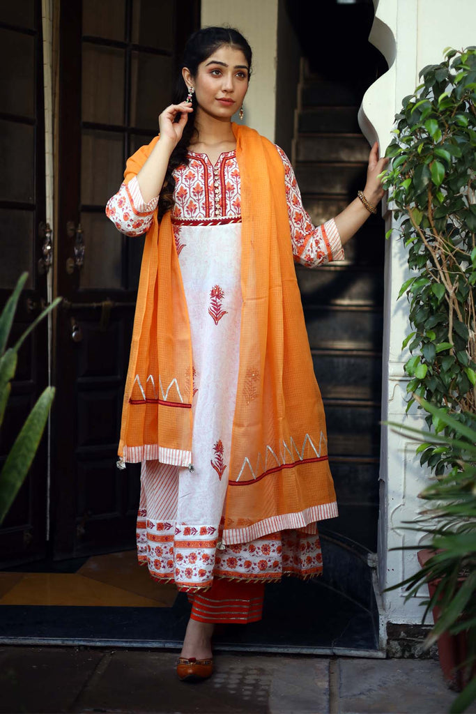 Kalidaar Kurta in orange color with cream base