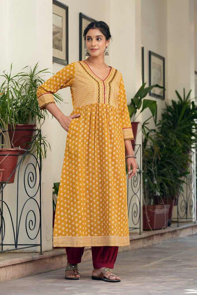 Mustard Yellow A-Line Kurta In Bagru Print