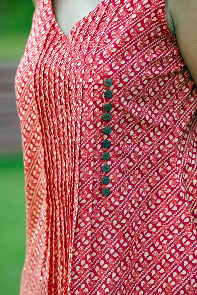 Sleeveless Short Length Kurti In Brick Red Color
