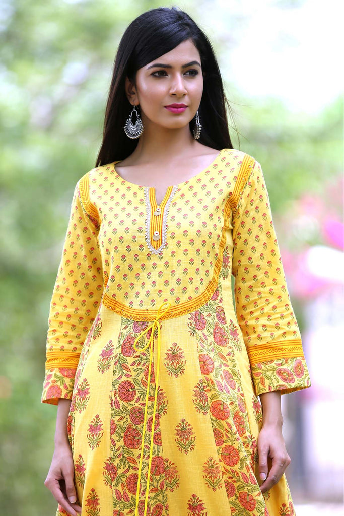 Yellow Kalidaar kurta with multiple prints