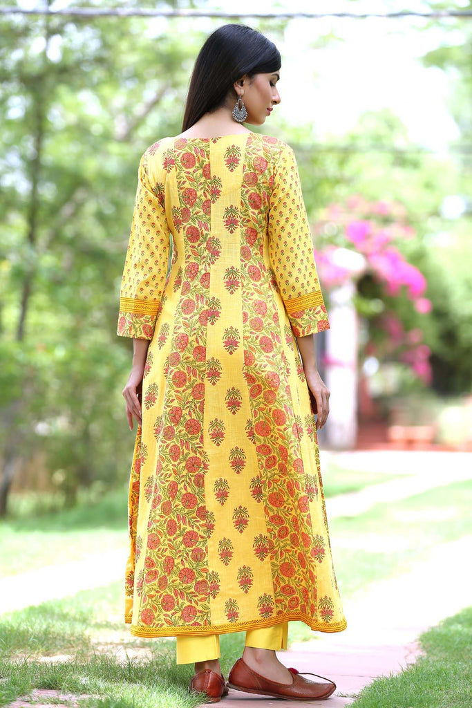 Yellow Kalidaar kurta with multiple prints