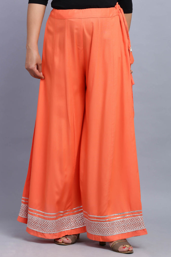 Single Color Flared Palazzos With Gota Border In Modal Fabric