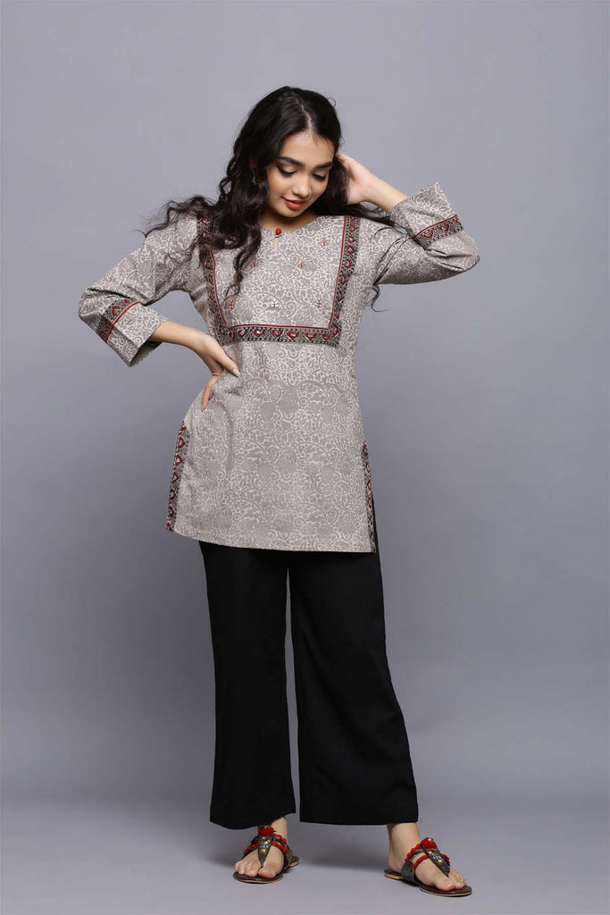 Short length kurti in metallic grey color