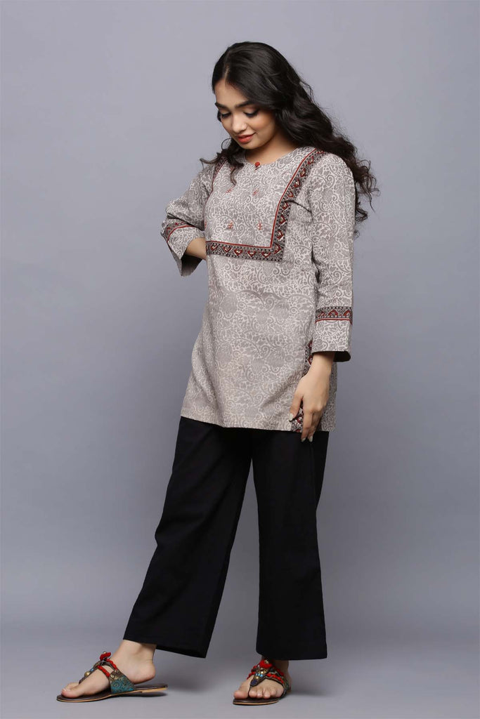 Short length kurti in metallic grey color