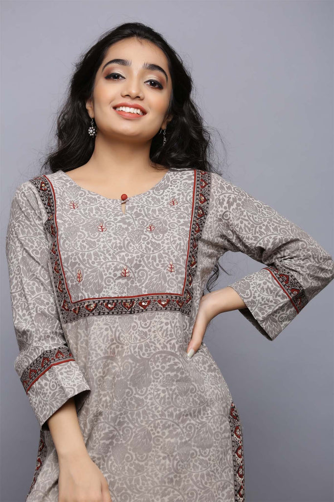 Short length kurti in metallic grey color