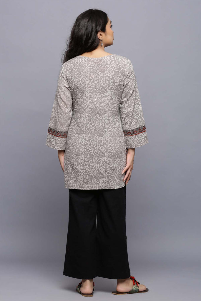 Short length kurti in metallic grey color