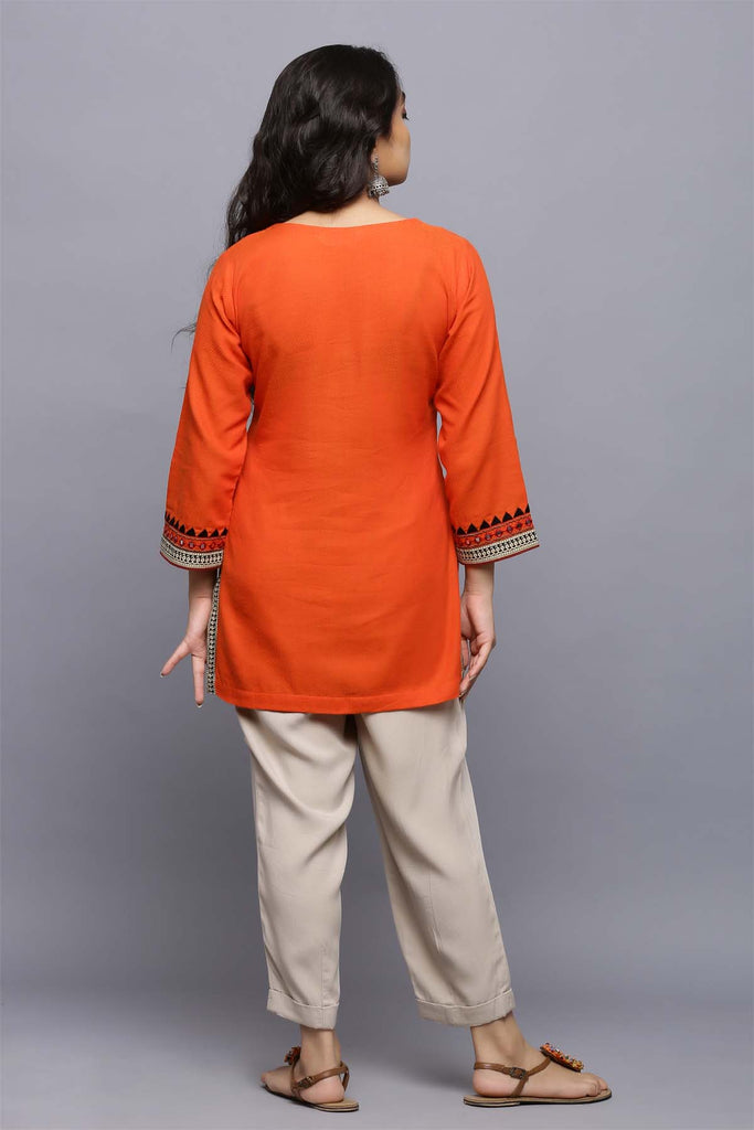 Short Length Kurti In Orange color
