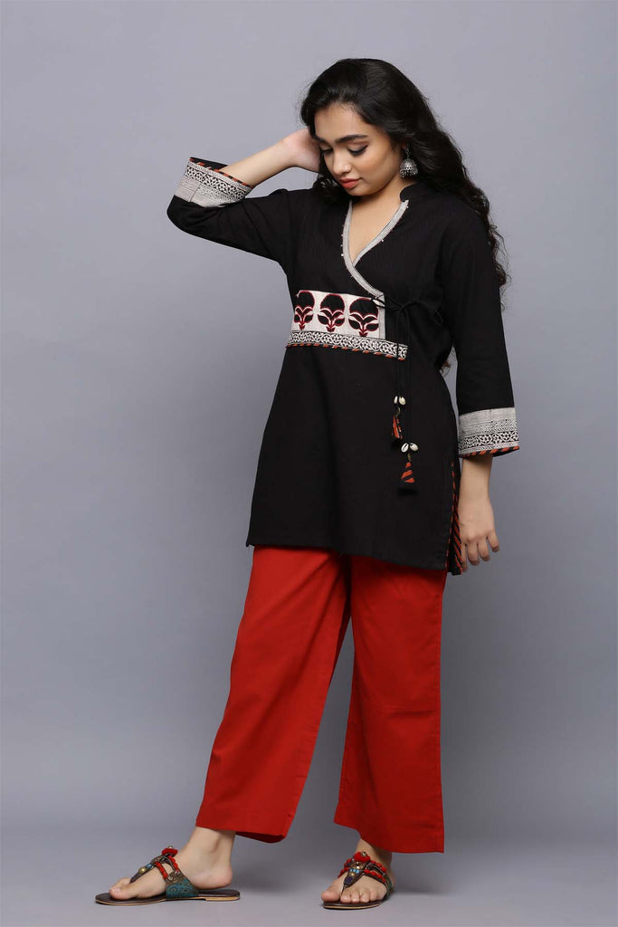 Short Length Angrakha Style Kurti In Black Color